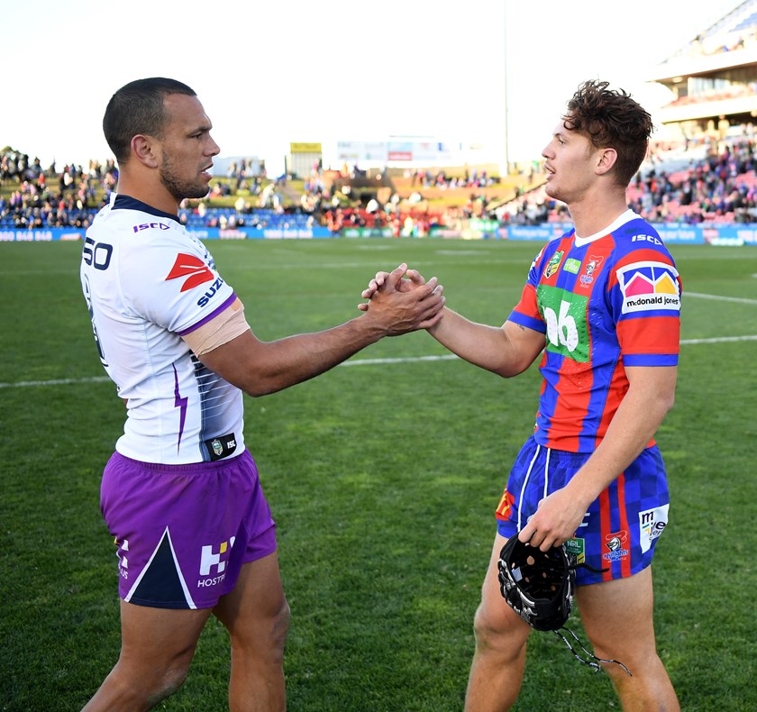 Kalyn Ponga with Melbourne's Queensland centre Will Chambers.