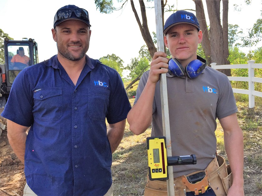 Titans five-eighth AJ Brimson (right) with employer Luke Hayes.