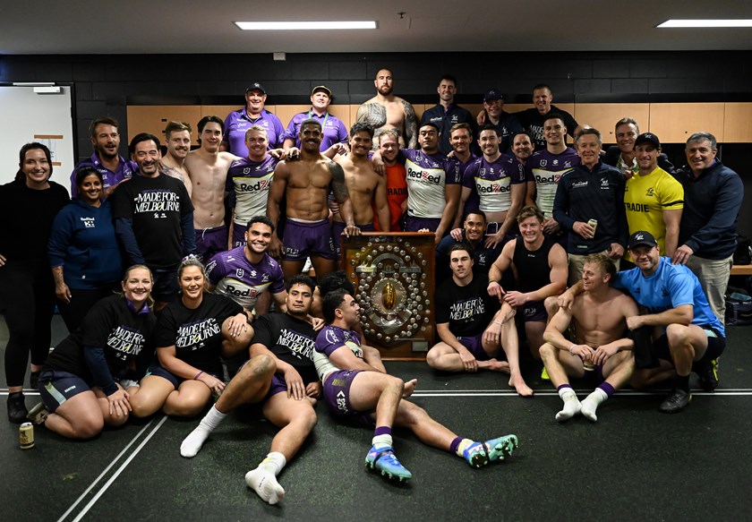 Storm players with the JJ Giltinan Shield for winning the 2024 minor premiership.