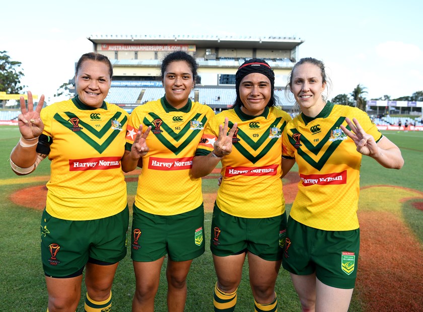 Elianna Walton, Zahara Temara, Vanessa Foliaki and Karina Brown celebrate a Jillaroos win at the 2017 World Cup.