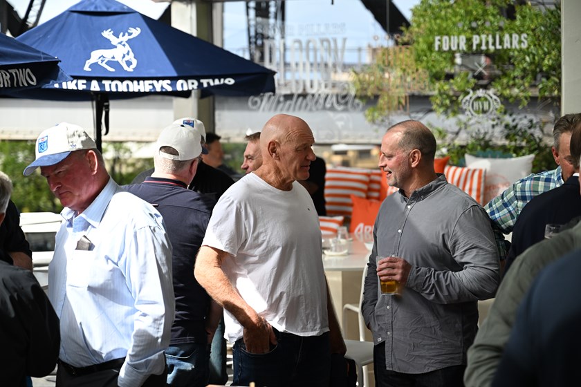 Peter Wynn from the Class of '85 chats to Michael Maguire at the Blues lunch in Sydney.