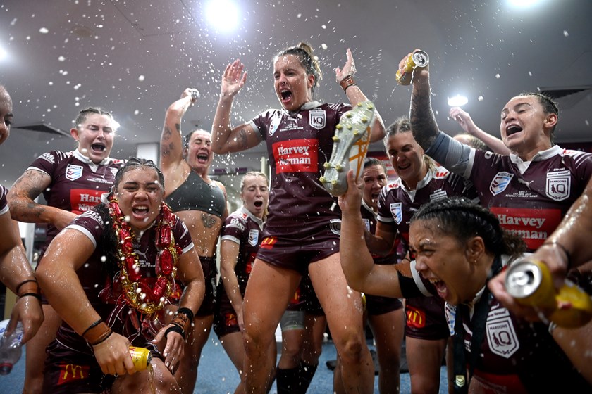 Lauren Brown and the Maroon's squad celebrate the Game Two victory at Newcastle.
