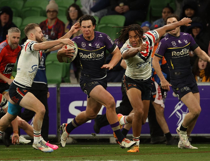 Jack Howarth fights his way through the Roosters defensive line on Saturday night.