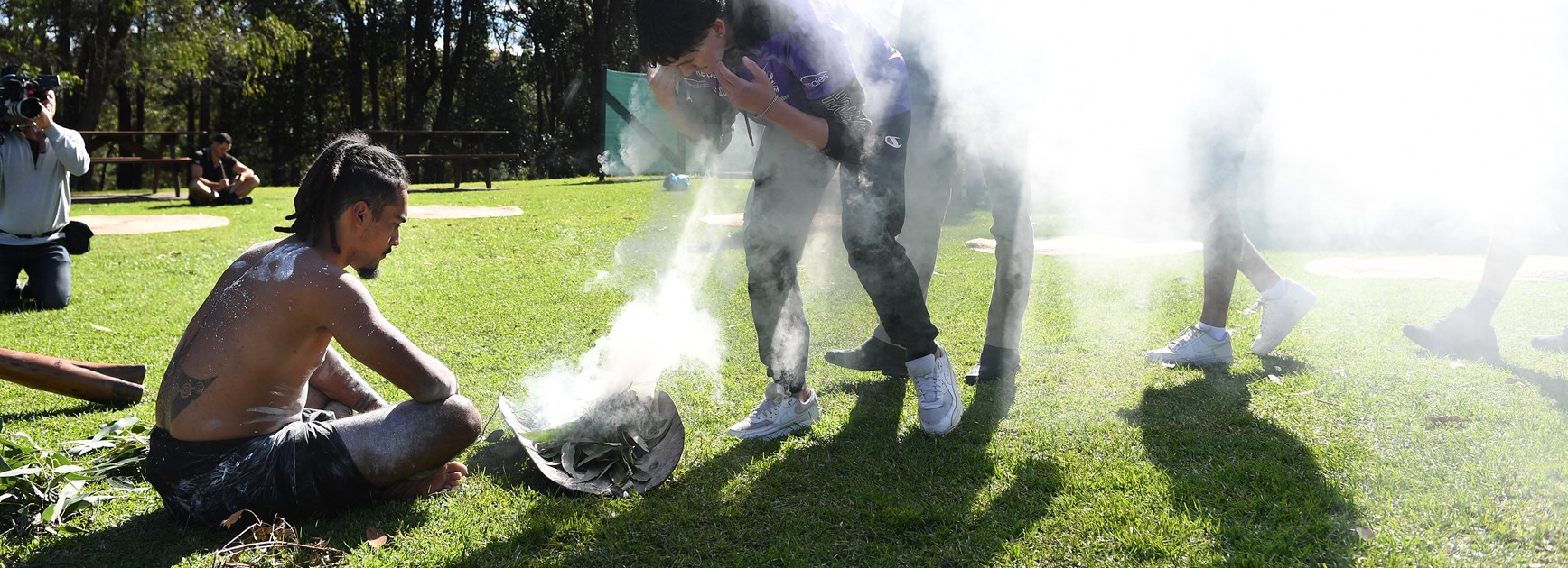 Attendees conduct a smoking ceremony at the Indigenous Youth Leadership Summit.
