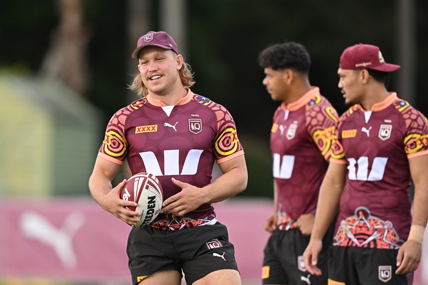 Reuben Cotter in the Carl Webb co-designed Maroons Indigenous training jersey.