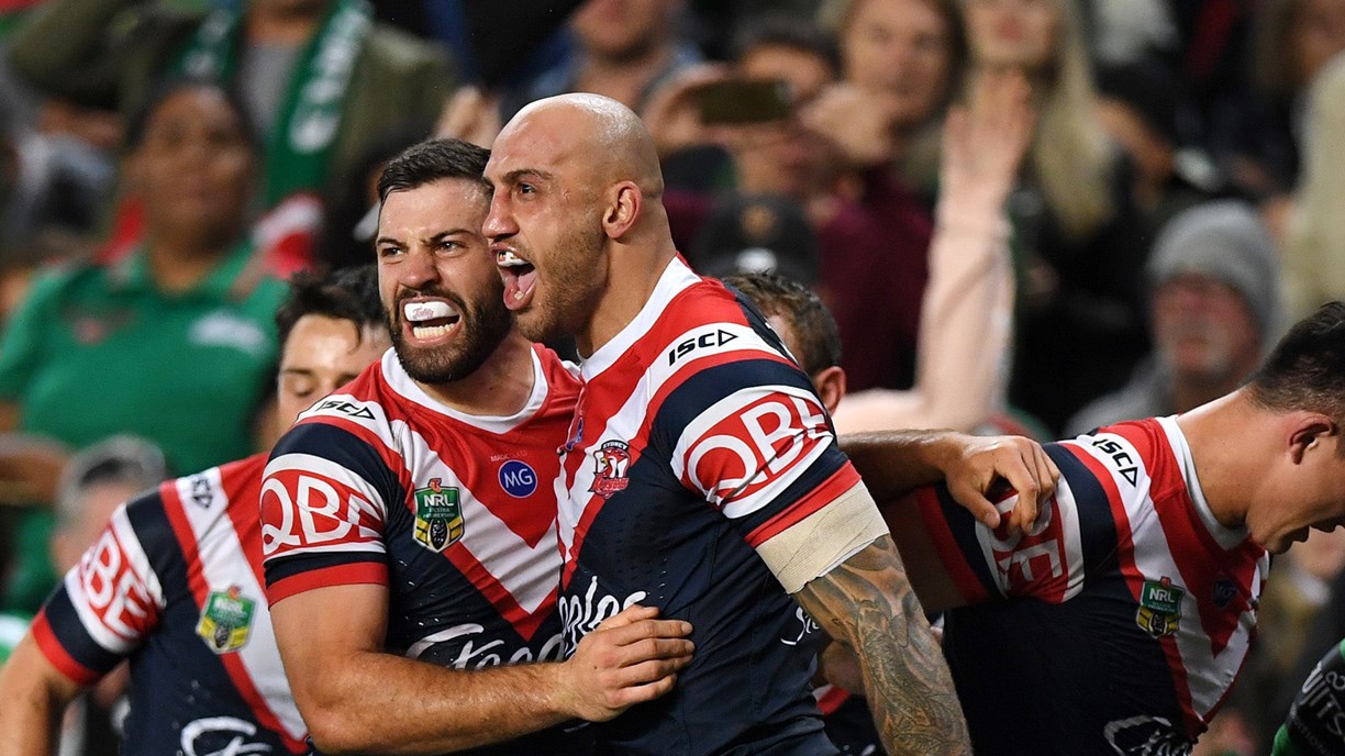 Roosters' finals hopes alive with NRL win over Dolphins