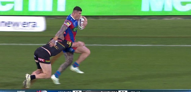 Edwards makes the tackle after a kick from the scrum