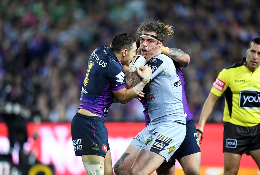 Cowboys back-rower Ethan Lowe takes on the Storm defence.