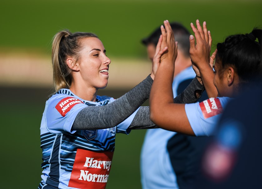 NSW Blues players preparing for the Women's State of Origin match.