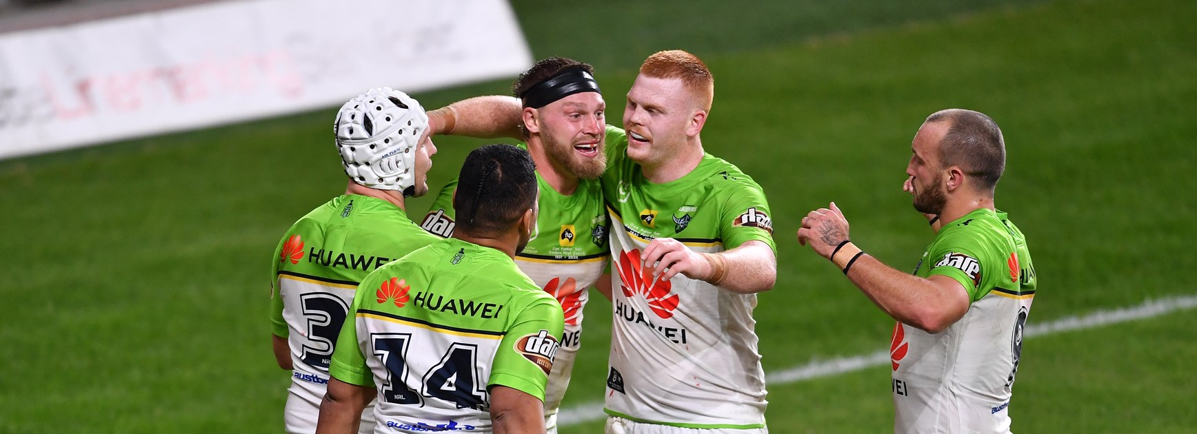 The Raiders celebrate an Elliott Whitehead try.