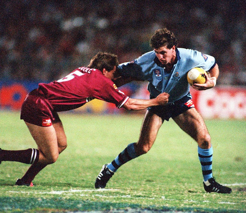 Michael O'Connor tries to fend off Willie Carne in 1991.