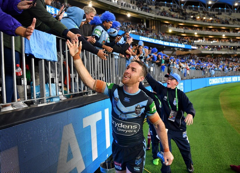 James Maloney celebrates with Blues fans after the win in Game 2, 2019.