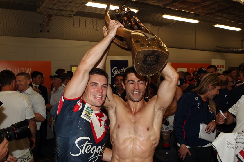 Daniel Mortimer (left) and Anthony Minichiello celebrate winning the 2013 premiership with the Roosters. ©NRL Photos