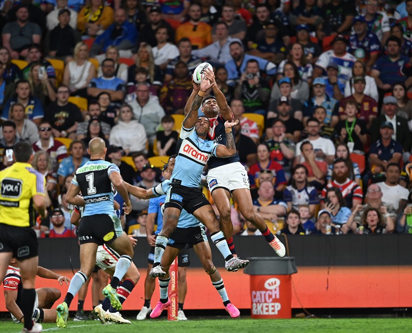 Daniel Tupou leapt through the air to snare his 150th NRL try. 