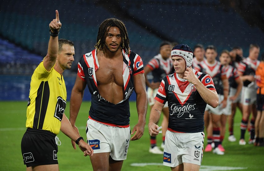 Dom Young receives his marching orders from referee Grant Atkins after a high shot on Bulldogs fullback Blake Taaffe.