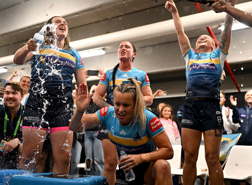 Celebrating a Titans win on the way to last year's NRLW decider.