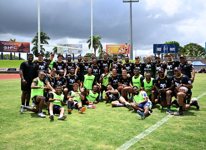 Kumuls players and coaching staff after their captain's run at HFC Stadium. 