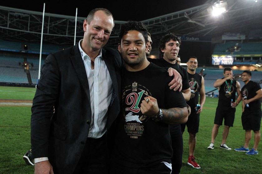Issac Luke with Michael Maguire after South Sydney's 2014 premiership win.