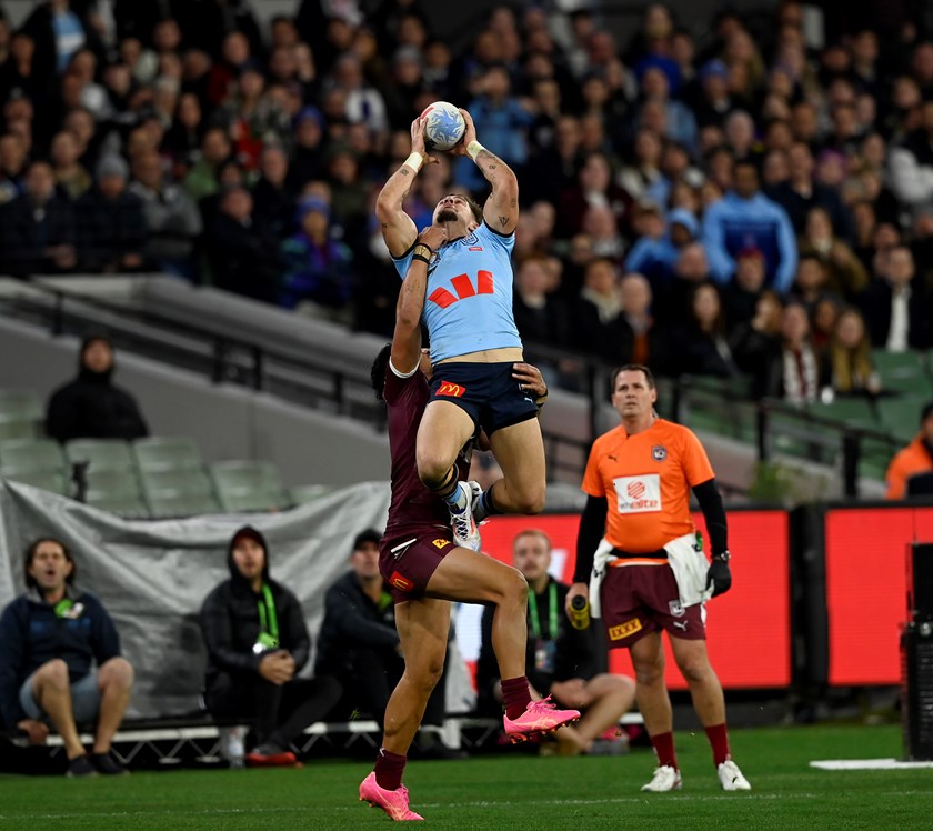 Zac Lomax soars above Murray Taulagi to score a stunning try at the MCG in Origin II.