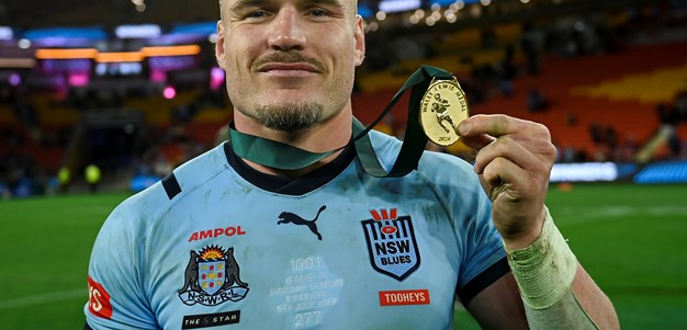 Crichton collects Wally Lewis Medal as player of series